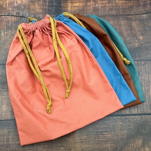 Pochons en coton enduit imperméable, personnalisable