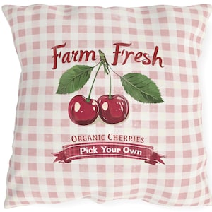 May include: Pink and white gingham pillow with a vintage illustration of cherries and the text "Farm Fresh Organic Cherries Pick Your Own".