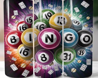 May include: A set of three stainless steel tumblers featuring a colourful bingo ball design. The tumblers display a variety of bingo balls with numbers and the word "BINGO" in the centre. The background is a dark purple with a starburst pattern.