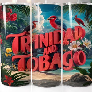 May include: A stainless steel tumbler with a tropical design featuring the words "Trinidad and Tobago" in red and yellow lettering. The design also includes tropical flowers, birds, and palm trees.
