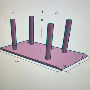 May include: A 3D model of a rectangular platform with four cylindrical supports. The platform is 181.00 inches long and 113.00 inches wide. The supports are evenly spaced along the length of the platform.