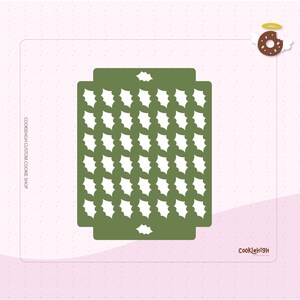 May include: A green cookie stencil with a repeating pattern of white holly leaves. The stencil is rectangular with a decorative edge, designed for festive cookie decorating. The CookieHigh logo is visible in the bottom right corner.