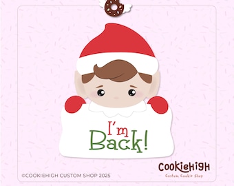 Op de afbeelding: Een cartoon elf met een rode muts en wanten houdt een bord vast met de tekst "I'm Back!" in groene letters. Een donut met vleugels en een halo zit boven het hoofd van de elf. Roze achtergrond.