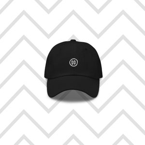 May include: A black baseball cap with a white embroidered circle containing the number "00" in the center.