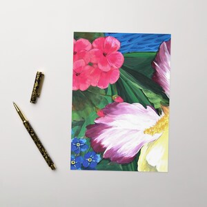 May include: A painting of pink, white, and yellow flowers with blue forget-me-nots. The flowers are painted in a realistic style with visible brushstrokes.