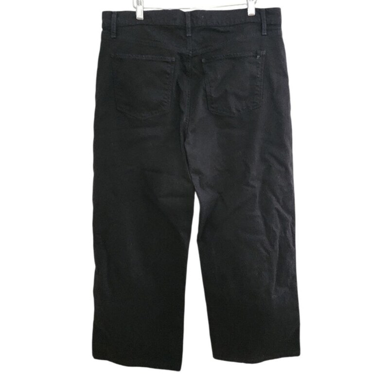 May include: Black denim pants with two back pockets. The pants are hanging on a white background. The pants have a classic five-pocket design and a straight leg cut.