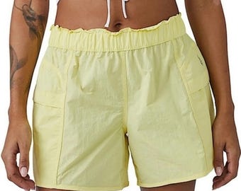Pantalones cortos deportivos de nailon Skyway de Free People Movement, amarillos, talla M para mujer