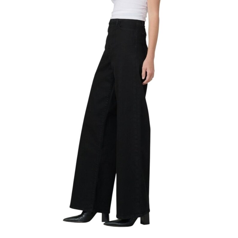 May include: Black wide-leg pants with a high waist. The pants are made of a dark fabric and have a classic design. The pants are paired with black pointed-toe heels.