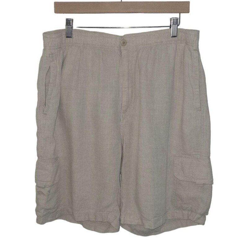 May include: Beige linen cargo shorts with a drawstring waist and two front pockets.