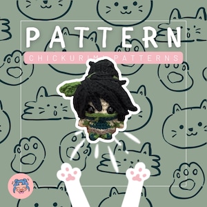 May include: A small crocheted doll with black hair, a green face mask, and a green and tan outfit. The image features the text PATTERN and CHICKURIMI PATTERNS over a light green background with a repeating pattern of simple cat face line drawings.