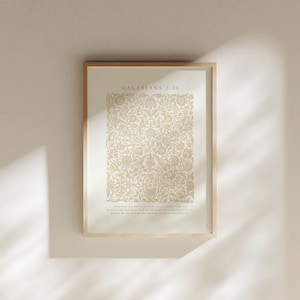 May include: A framed print with a beige background and a gold floral pattern. The print features the text "GALATIANS 2:20" and a Bible verse.