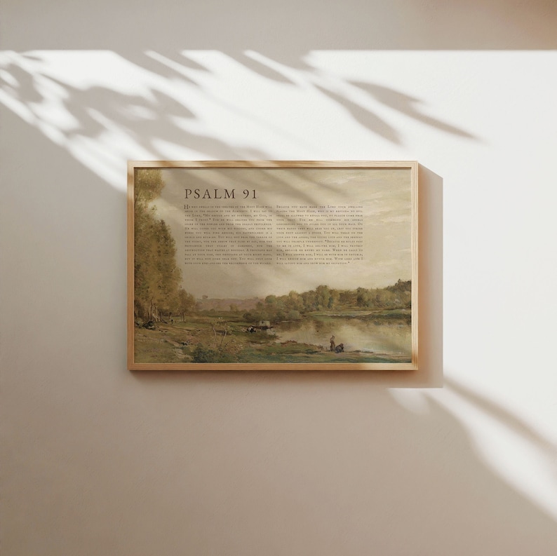 May include: A framed print of Psalm 91 with a watercolor painting of a river scene. The text reads "He that dwelleth in the secret place of the most High shall abide under the shadow of the Almighty. I will say of the Lord, He is my refuge and my fortress: my God; in him will I trust."