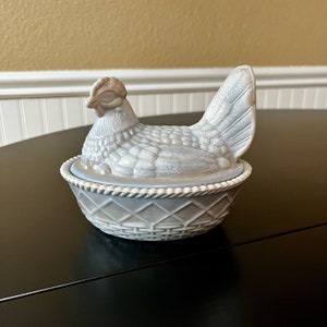 Westmoreland/Rosso Marble Slag Glass Covered Chicken with a Split Tail on a Woven Nest