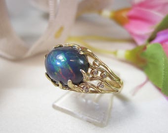 Helt ny guldring med naturlig etiopisk svart opal 2,6 ct, ringstorlek 7, N5