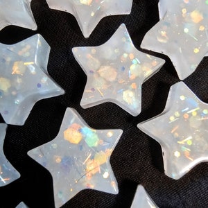 Imanes con forma de estrella que brillan en la oscuridad