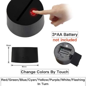 May include: A black touch-activated LED light base with a red touch sensor. The base is 3.5 inches tall and 8.5 inches in diameter. The light changes colors by touch, cycling through red, green, blue, cyan, yellow, purple, white, and flashing. The light requires 3 AA batteries, which are not included.