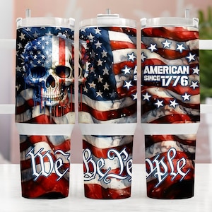 May include: Three stainless steel tumblers with a white background and an American flag design. The tumblers feature a skull, the words "American Since 1776", and the words "We The People".