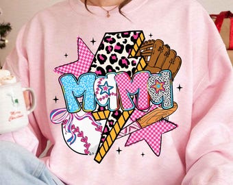 May include: Pink sweatshirt featuring a graphic design of the word "MAMA" in colourful letters with a baseball, bat, and glove. The design is surrounded by stars and a lightning bolt.