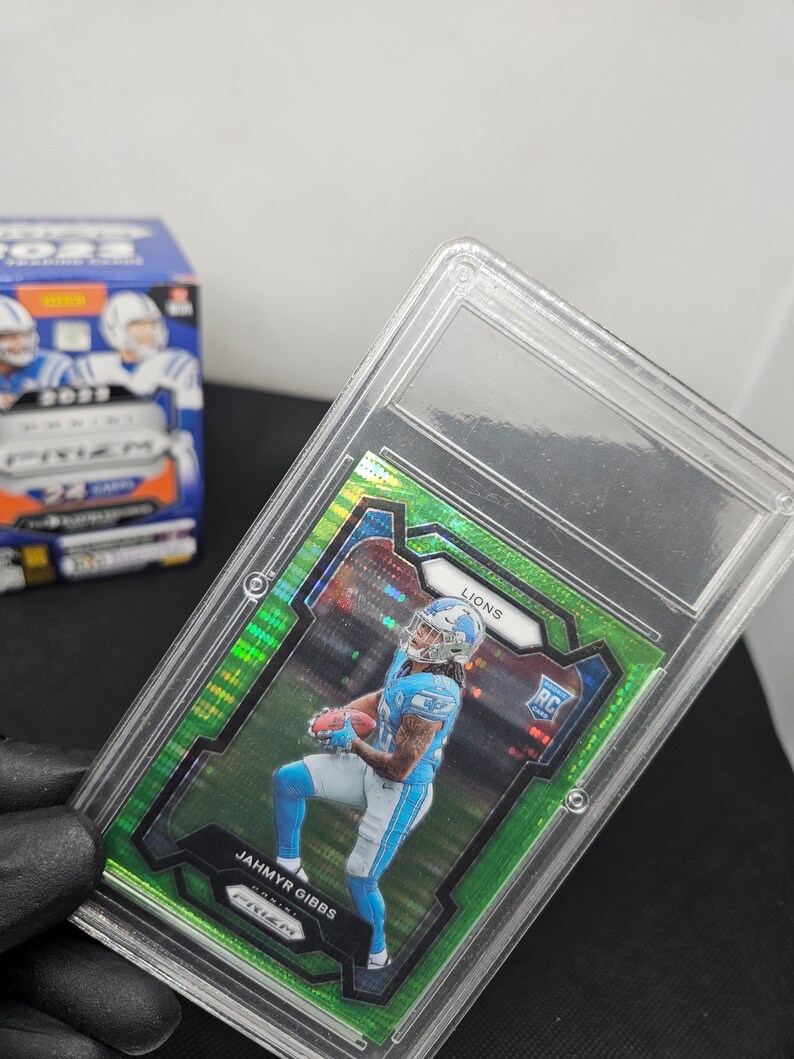 Jahmyr Gibbs Sports Card, Panini Prizm 2024, Green Rookie Pulsar, Card