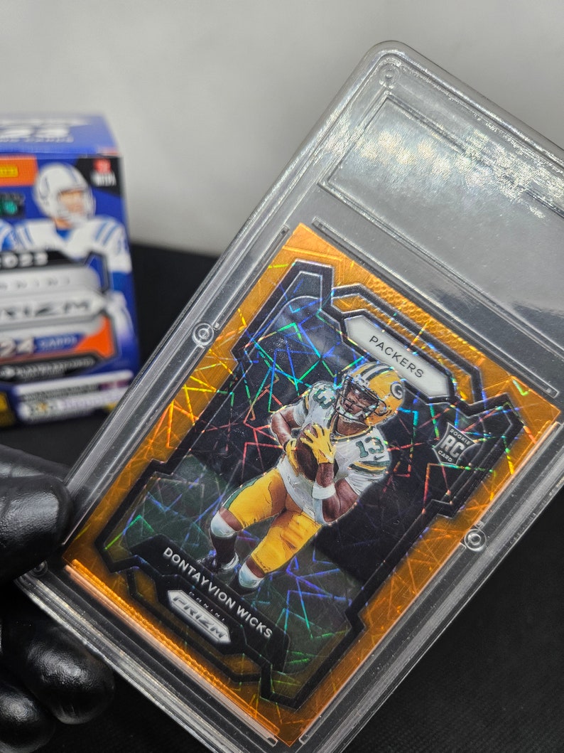 Dontayvion Wicks Trading Card, Panini Football Prizm 2024,orange Laser