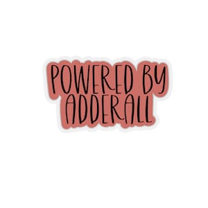 May include: A pink sticker with white border featuring the text "POWERED BY ADDERALL" in black.