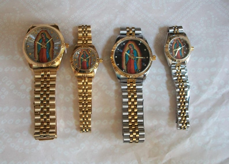 May include: Four wristwatches with gold and silver bands. Each watch face features a colorful image of a religious figure.