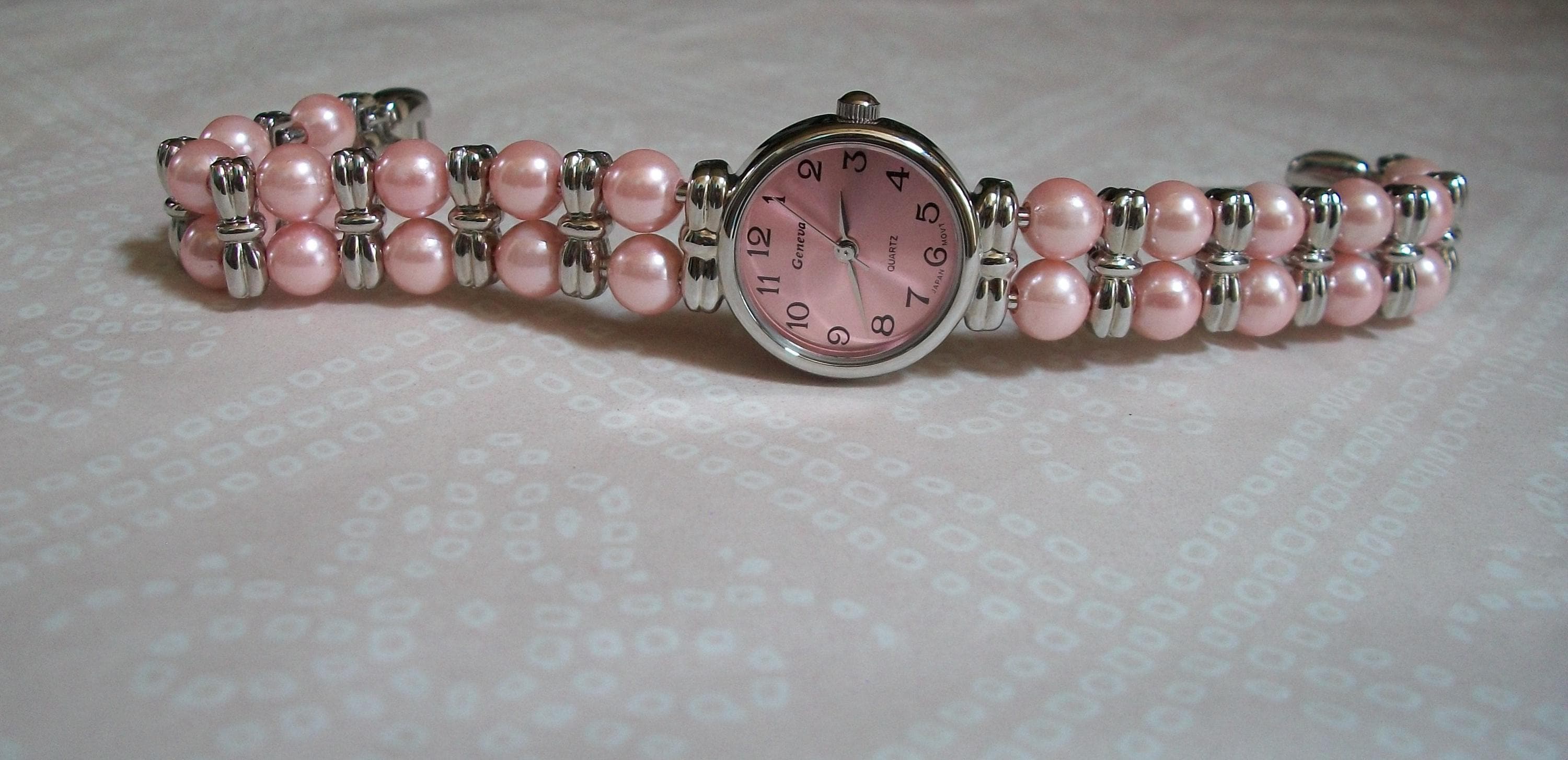 Montre Femme Rumours 29424 - Bracelet Maillons Perles Breloques - Argenté Et Rose/bleu - Occasion (batterie à Changer)