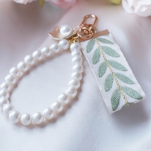 Llavero perla elegante pulsera de concha marina para mujer accesorio de bolso para su idea de regalo para llavero estético BFF para mujer llavero de lujo