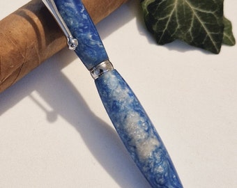 Hand-turned ballpoint pen made of epoxy resin blue and mother-of-pearl in silver