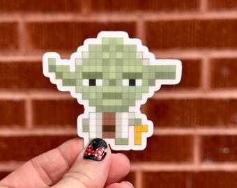 Naklejka Yoda Pixel Art — Mistrz Jedi w stylu science fiction, retro naklejka winylowa