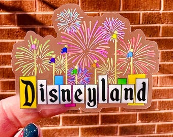 Naklejka z napisem Disneyland w stylu retro z fajerwerkami | Naklejka Disney z parku rozrywki w stylu retro z połowy XX wieku