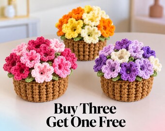 May include: Three crocheted flower arrangements in brown baskets. One features pink flowers, one has orange and yellow flowers, and one contains purple and white flowers. The text "Buy Three Get One Free" is printed at the bottom of the image.