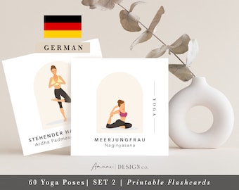 May include: Printable yoga flashcards featuring illustrations of yoga poses. The cards display figures in various poses, with the names of the poses in German. The set includes cards with the text "STEHENDER H/ Ardha Padmasana" and "MEERJUNGFRAU Naginyasana". The cards are labeled "60 Yoga Poses | SET 2 | Printable Flashcards".