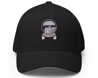 May include: Black baseball cap with an embroidered patch featuring a parachute, a soldier, and the word "GERONIMO".