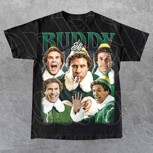 May include: Black t-shirt with a collage of Buddy the Elf from the movie Elf. The shirt features multiple images of Buddy in different poses, including him eating spaghetti and wearing a green elf hat. The text "Buddy Elf" is printed in white on the shirt.