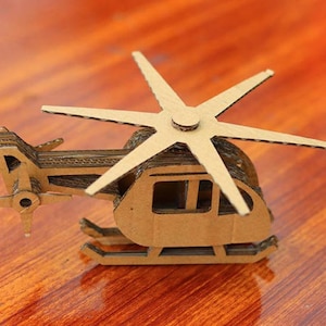 Helicóptero de cartón cortado con láser para niños Juguetes de cartón cortado con láser cdr dxf svg pdf Vector