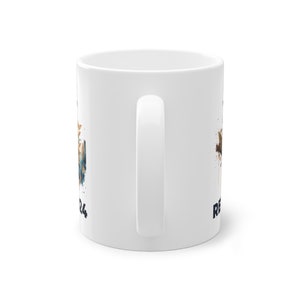 May include: White ceramic mug with a blue and brown watercolor design and the text "2024" on the left side and "Remember" on the right side.