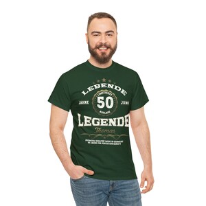 May include: Green t-shirt with a gold design that says "LEBENDE 50 JAHRE LIMITIERTE AUFLAGE JUNG LEGENDE Thomas PREMIUM QUALITAT MADE IN GERMANY 50 JAHRE ZUR PERFEXTION GEREIFT".
