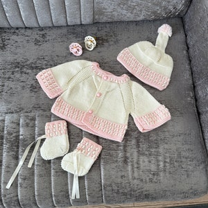 hand knitted newborn baby cardigan, hat and booties
