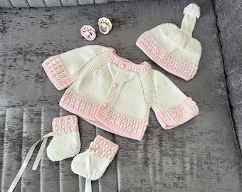 hand knitted newborn baby cardigan, hat and booties