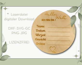 May include: A round wooden sign with engraved text and lines for filling in baby's details. The sign says "Hallo Welt" and "ICH BIN DA!" with spaces for Name, Datum, Uhrzeit, Gewicht, and Grösse. The sign is surrounded by a green and white border.
