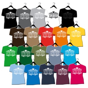 May include: A collection of 20 t-shirts in various colours, each featuring a white graphic design with the word "VERMINE" in a decorative font.
