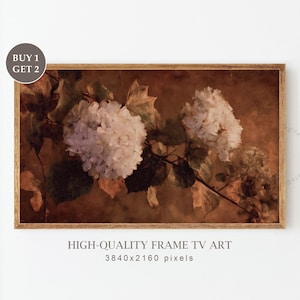 May include: A framed print featuring white hydrangea blooms against a sepia-toned background. The artwork includes the text "HIGH-QUALITY FRAME TV ART" and "BUY 1 GET 2". The frame is a warm, natural wood color.