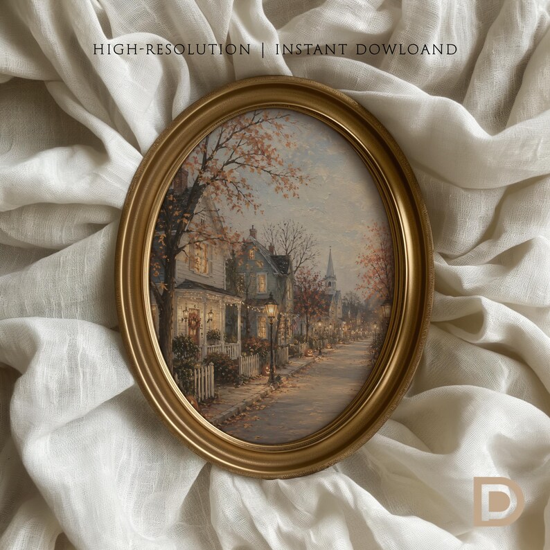 May include: An oval gold frame containing a painting of a quiet street scene with houses, trees, and a church steeple at dusk. The text HIGH-RESOLUTION | INSTANT DOWLOAD is visible at the top, and a letter D logo is in the bottom right corner.