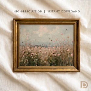 May include: A framed landscape painting depicting a field of pink wildflowers beneath a cloudy sky. The artwork is set within a gold-coloured, ornate frame. Text at the top reads "HIGH-RESOLUTION | INSTANT DOWLOAND".