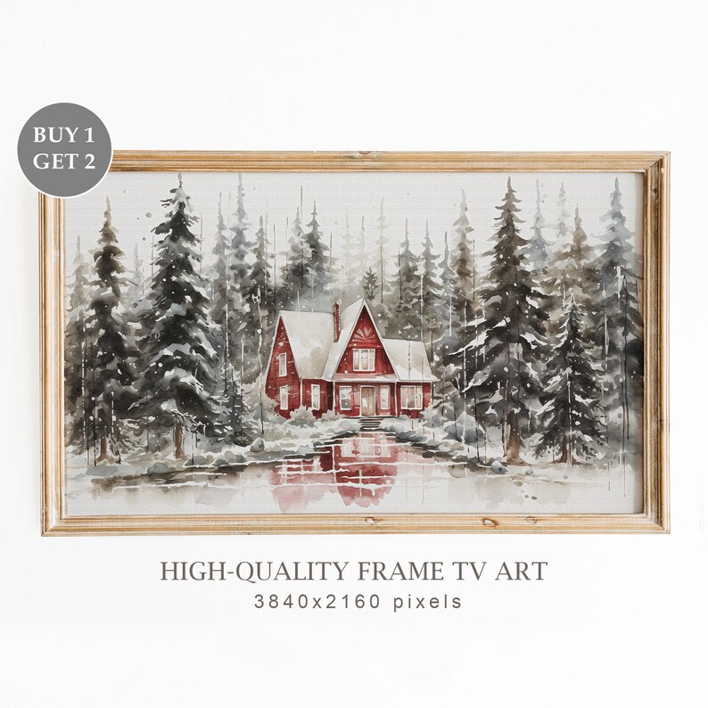 May include: A watercolor painting of a red cabin in a snowy forest. The cabin has a white roof and is surrounded by tall, dark green trees. The ground is covered in snow and there is a small lake in front of the cabin. The painting is framed in a light wood frame.