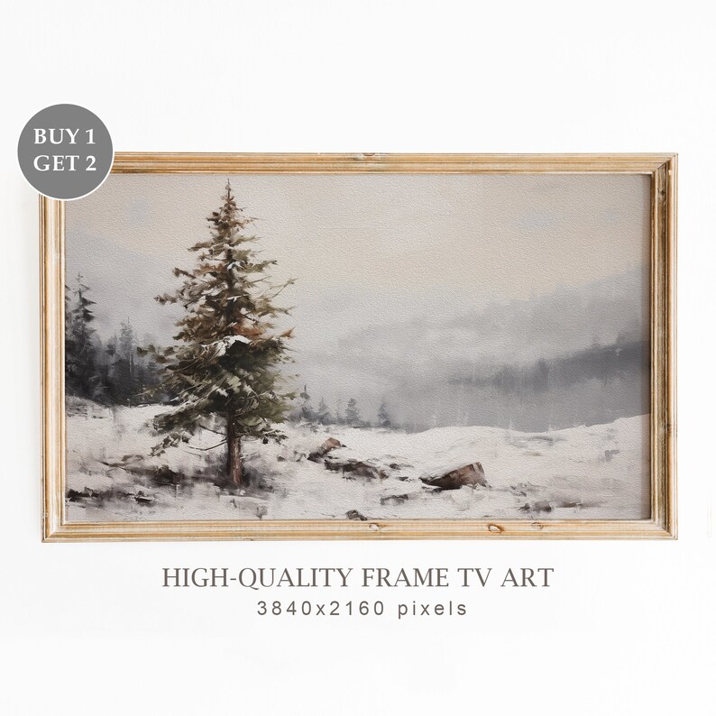 May include: A framed watercolor painting of a snowy landscape with a single evergreen tree in the foreground. The painting is in a light wood frame and has a muted color palette of grays, browns, and greens. The text "HIGH-QUALITY FRAME TV ART 3840x2160 pixels" is printed below the frame.