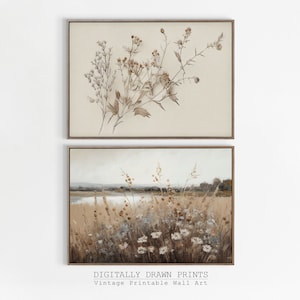 May include: Two framed prints of nature scenes. The top print features a delicate brown and white floral arrangement. The bottom print shows a field of wildflowers with a lake in the background.