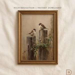 May include: A framed painting featuring two sparrows perched on weathered wooden posts. The artwork has a vintage aesthetic, with soft colors and detailed brushstrokes. The text "HIGH-RESOLUTION | INSTANT DOWLOAND" is visible at the top. The frame is gold.