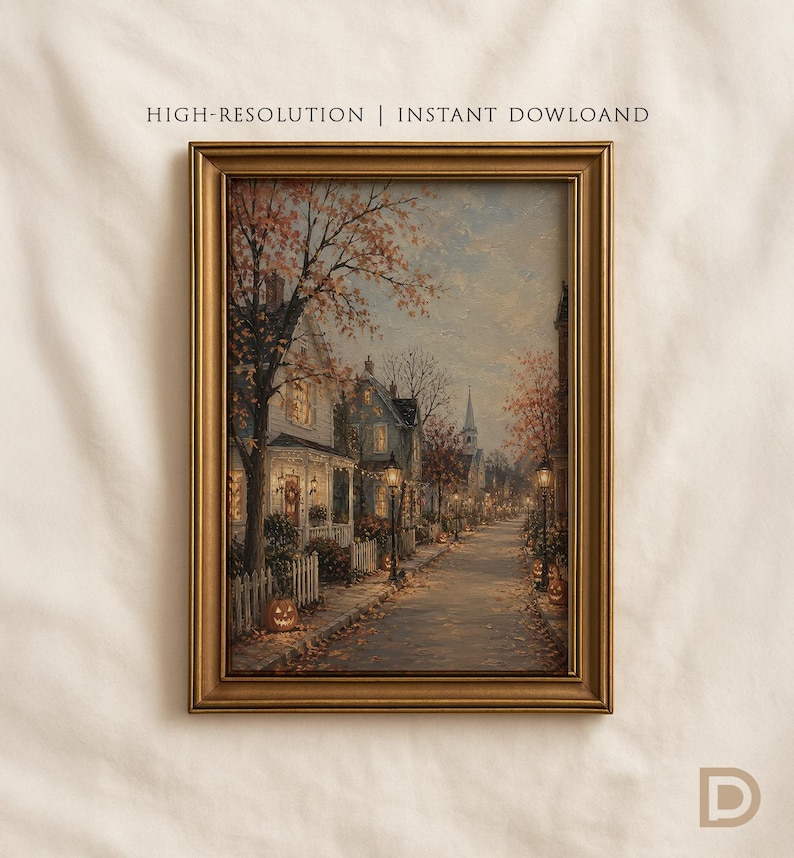 May include: A framed wall art print featuring a street scene with houses, trees with autumn leaves, street lamps, and jack-o'-lanterns. The text HIGH-RESOLUTION | INSTANT DOWLOAND is visible at the top, and the letter D is in the bottom right corner.